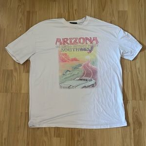 oversized T-shirt, size small, slight stain on the back which is removable.